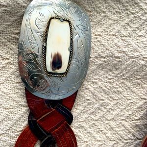 Leather brown braided belt with beautiful buckle. Great condition